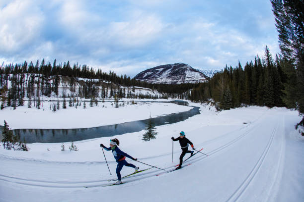 istock Cross-Country Skiing by the River 2160296327