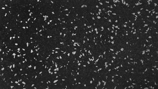 istock dark black and white grain terrazzo floor texture use as background. polished stone for interior decoration. beautiful terrazzo matt tile stone in close up view. 2160300799