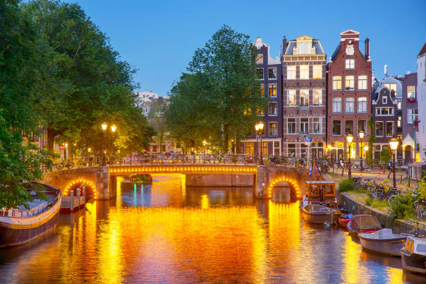 istock Houses and bridge in Amsterdam 2160301026