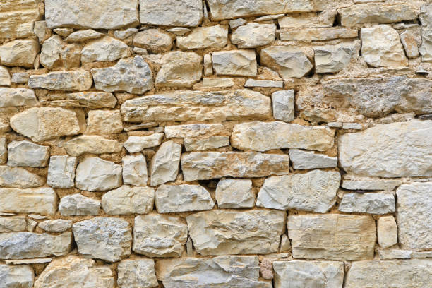 istock Background of a natural stone masonry wall texture 2160304987