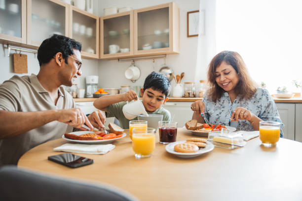 Family at home starting their day in the kitchen