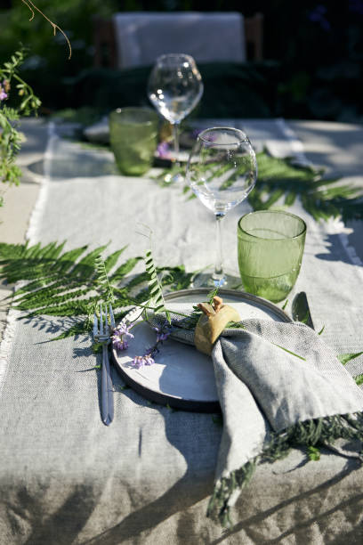 istock summer holiday table setting in the backyard in a forest-inspired green palette 2160310398