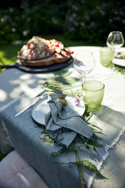 istock summer holiday table setting in the backyard in a forest-inspired green palette 2160310405