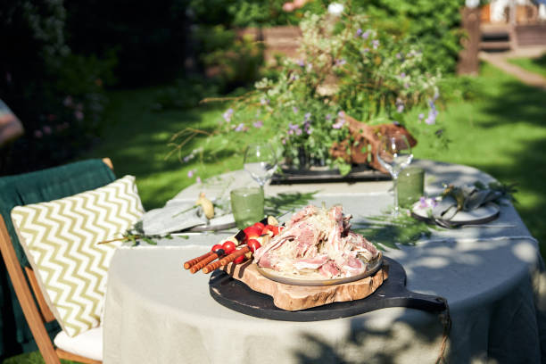 istock summer holiday table setting in the backyard in a forest-inspired green palette 2160310414