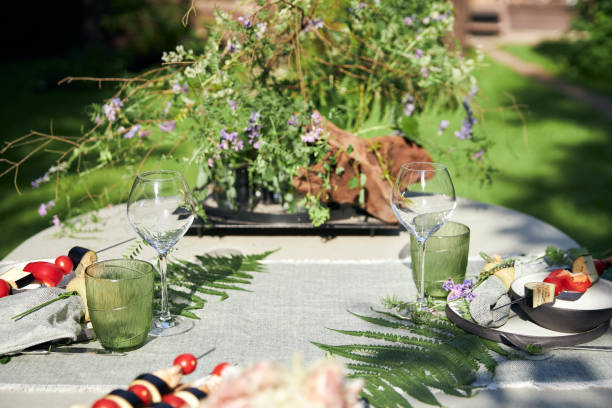 istock summer holiday table setting in the backyard in a forest-inspired green palette 2160310650