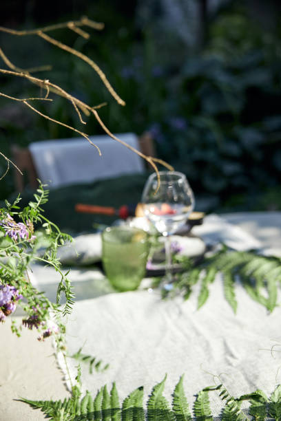 istock summer holiday table setting in the backyard in a forest-inspired green palette 2160310670