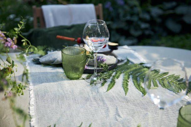 istock summer holiday table setting in the backyard in a forest-inspired green palette 2160310688