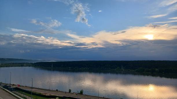 istock Sunset on the background of the river 2160313524