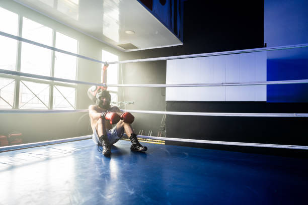 istock Young man boxer in the fighting ring 2160325067