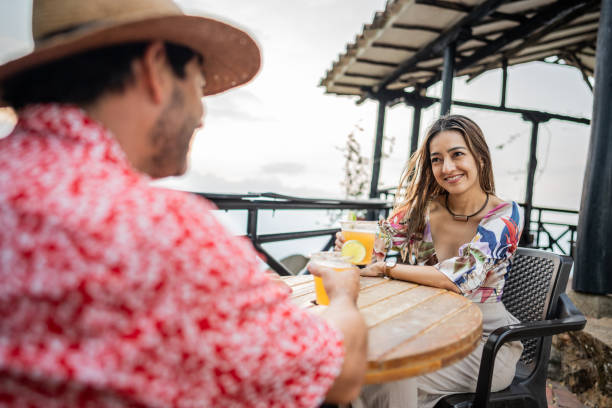 istock Couple toasting at bar 2160325684