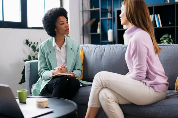 istock Female therapist offering guidance in therapy session 2160331718