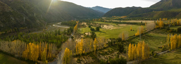 istock Panoramic view of mountains Andes vallery and road in Chile. 2160332010