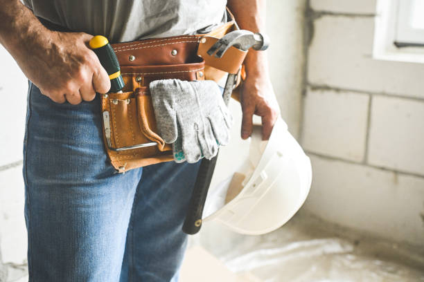 istock worker doing renovations in an apartment 2160332095