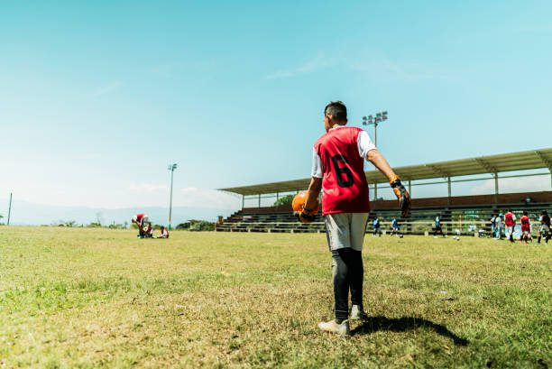 istock Goalkeeper kicking the ball during soccer match 2160333687