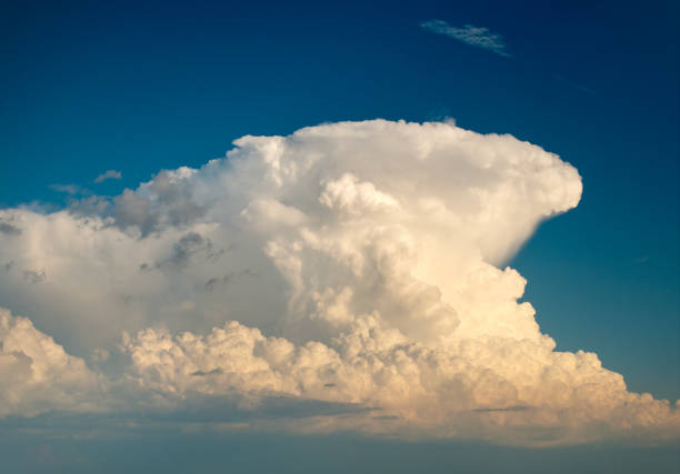Rain clouds forming on blue Florida sky. Colorful summer skyscape.