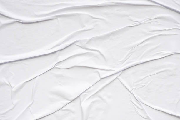 istock White blank crumpled and creased paper poster texture background 2160346318