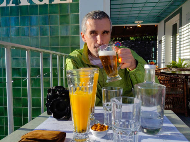 istock Embracing Staycation. Have a Beer in a Local Cafe in Madeira. 2160346414