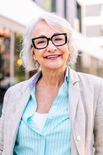 istock mature woman smiling happy looking at camera 2160347505