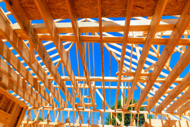 istock Building a new home using timber trusses framed with joints in roofing 2160348301