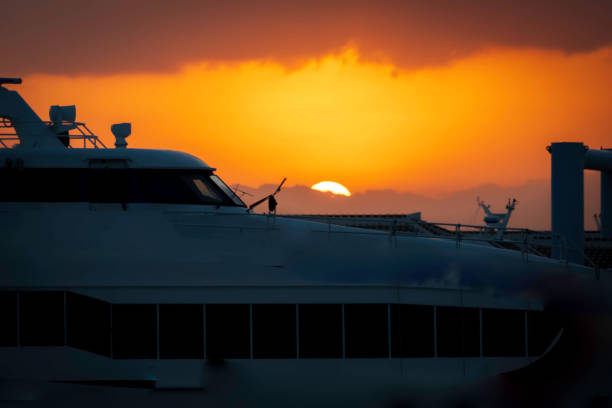 A ferry sailing in the Baltic Sea at sunset to the port of Tallinn. High quality photo