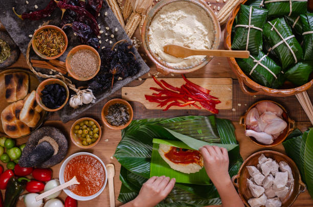 istock Wooden table with ingredients to make tamales. 2160350577