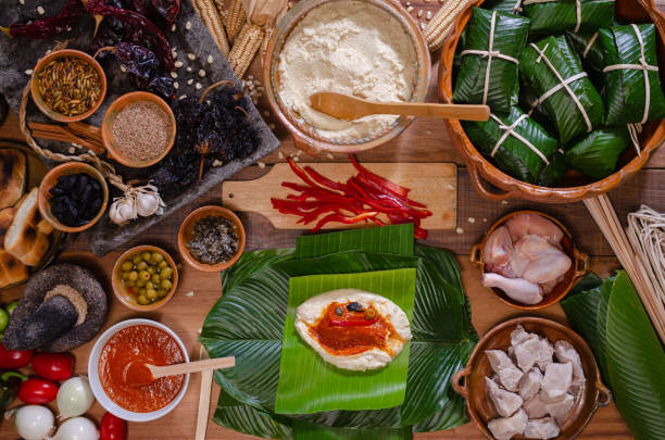 istock Wooden table with ingredients to make tamales. 2160350701