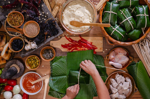 istock Wooden table with ingredients to make tamales. 2160350724