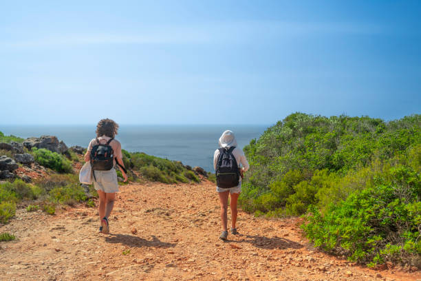 istock Woman practicing trail or hiking 2160354815