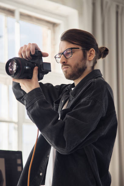 istock Photographer in Studio Photoshoot 2160357340