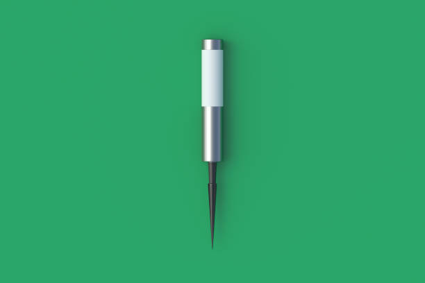 Professional dental instruments arranged on a plastic-covered tray. Stainless steel tools used in clinical dentistry for treatment and examination.