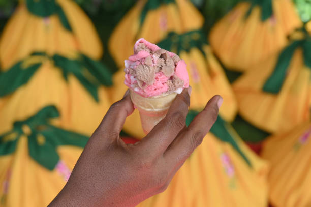 Cropped hand holding ice cream in Aceh, Indonesia