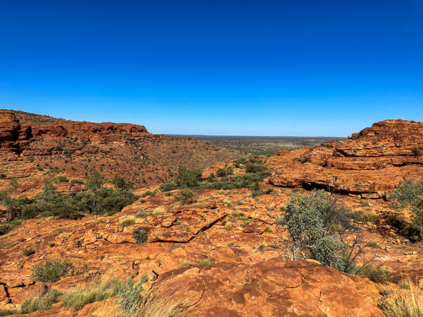 istock Sandstone formation in the Red centre and flat plain 2160365658
