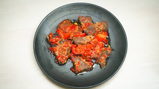 istock Lung beef (paru balado) cooked in spicy balado seasoning, which is sure to arouse appetite, selective focus and close up 2160372700