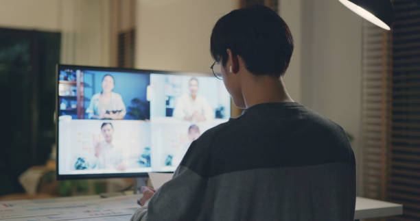 istock Man Participating in a Remote Team Video Meeting. 2160373429