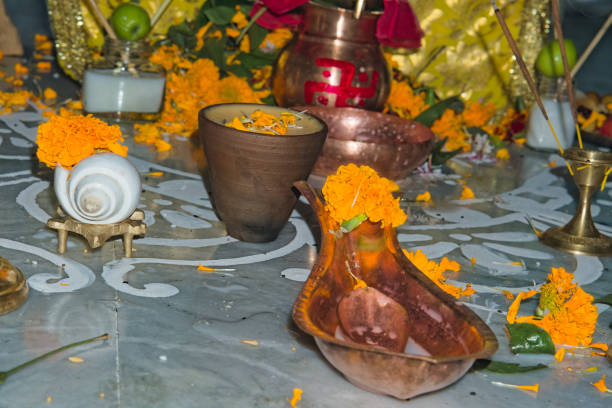 istock still picture image of floor where holy puja is performed alongwith utensils incense sticks and candles in India 2160376287