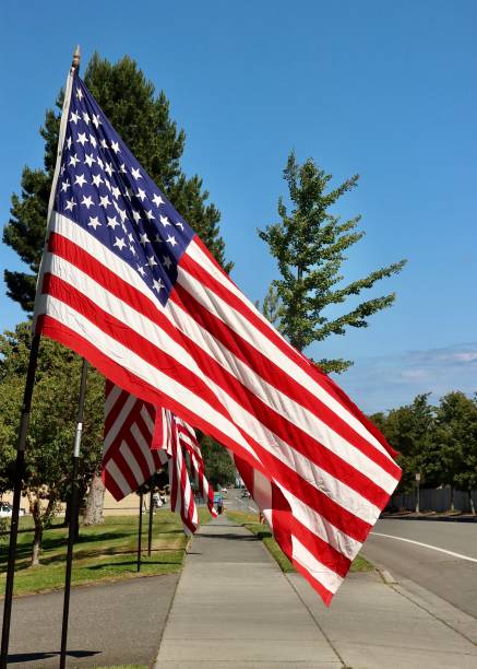 Sidewalk display of American flags for the Fourth of July