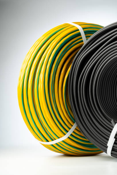 istock Yellow And Black Electrical Wire Spools Isolated On White Background 2160384455
