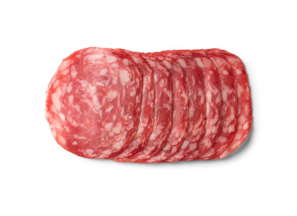 istock Sliced salami isolated on white background. Top view. 2160385347