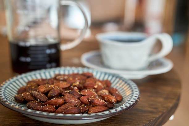 roasted almond and coffee on table