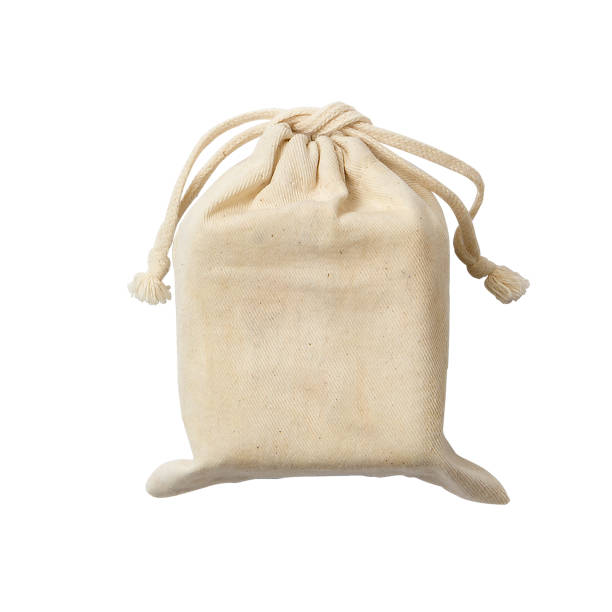 istock Brown textured sack Full cotton eco bag isolated on white background 2160386789