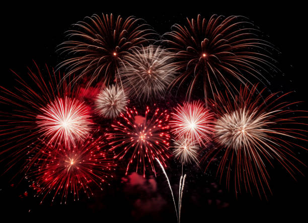 istock DIfferent colros and types of fireworks in the sky background 2160391103