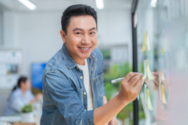 istock Ideas sharing engineer team meeting brainstorm internal meeting presentation, teaching and corporate, men and women. Documents, manager and graphs for financial stats, accountants and finance in office, laptop and strategy 2160395893