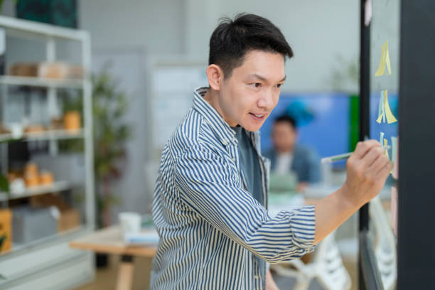 istock Ideas sharing engineer team meeting brainstorm internal meeting presentation, teaching and corporate, men and women. Documents, manager and graphs for financial stats, accountants and finance in office, laptop and strategy 2160395987