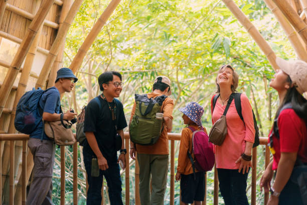 istock Group of Diverse Travellers in Awe Looking at Bamboo Villa 2160396079