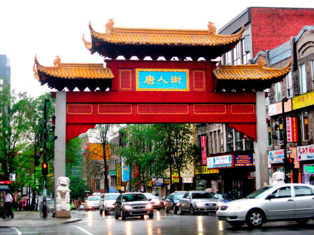 Red arch in city street, Chinatown, Montreal, Canada