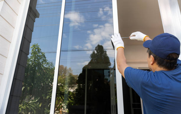 istock Handyman repairing the sliding window. Adjust window hook sliding. 2160402212