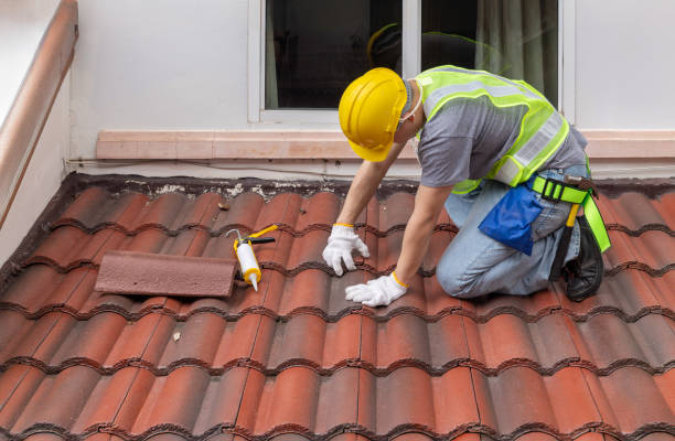 Construction worker is inspecting roof tile cracked. Construction worker is inspecting roof tile cracked. roof repair stock pictures, royalty-free photos & images