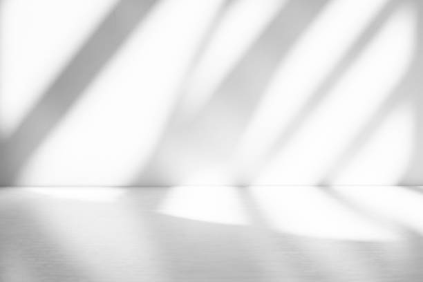 istock Wall interior background, studio and backdrops show products.with shadow from window color white . background for text insertion and presentation product 2160406497