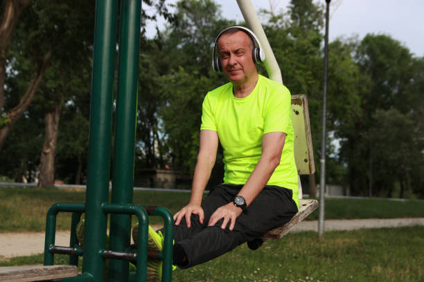 istock Training for legs mature man 2160407001