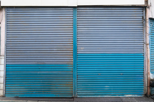 istock Blue and gray garage door 2160408400